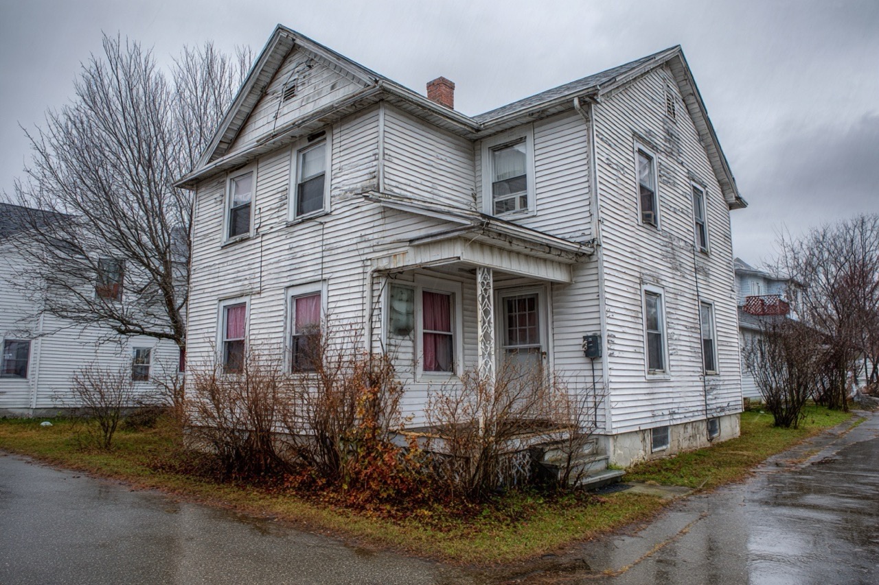 Multi-family rental property for sale in New Hampshire with moderate wear